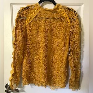 INA lace cutout blouse Medium